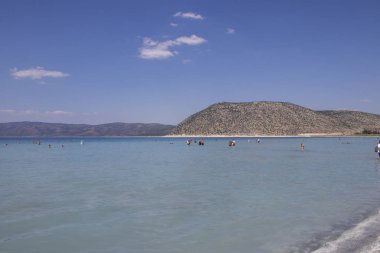 Gölde çırpınan insanlar, Salda Gölü, Burdur Türkiye