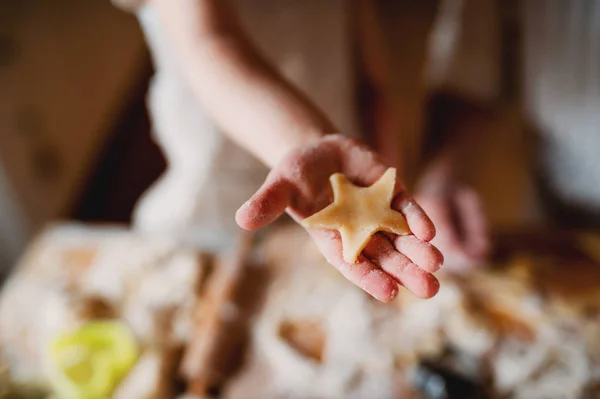 A midsection of small toddler boy making cakes at home. — Stock Photo, Image