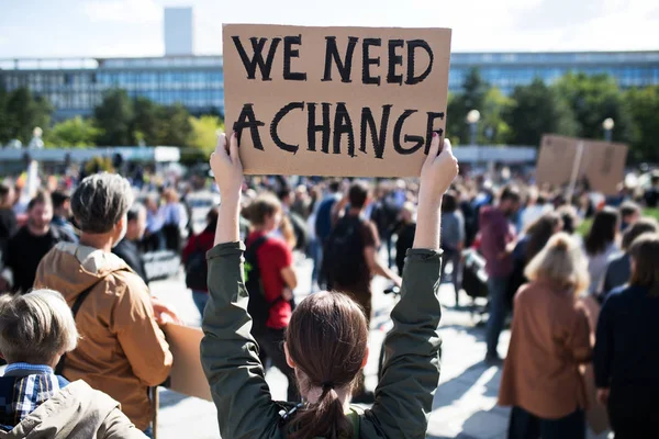 Rear view of people with placards and posters on global strike for climate change. — Stock Photo, Image