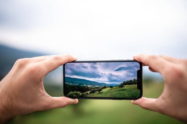 NOVA BANA, SLOVAKIA - SEPT 25, 2019: New Apple iPhone 11 Pro smartphone. clipart