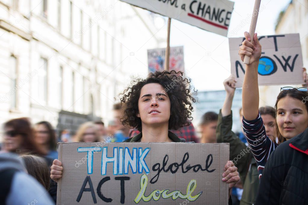 People with placards and posters on global strike for climate change.