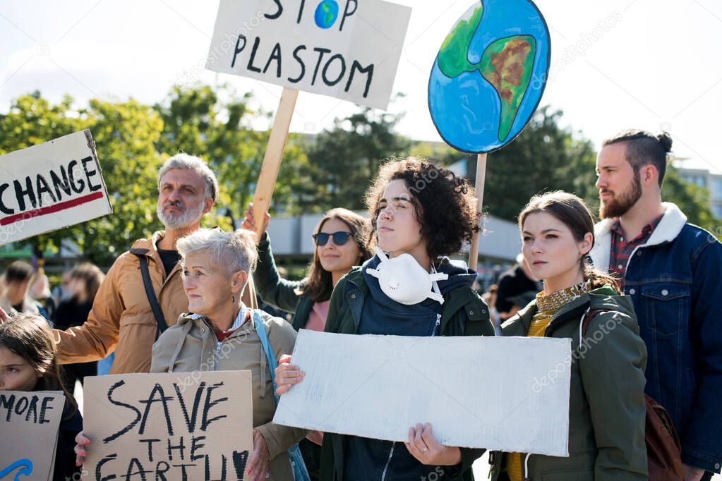 People with placards and posters on global strike for climate change.