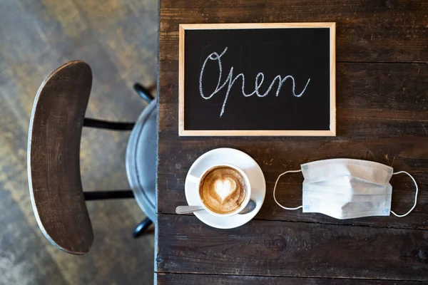 Reopening of cafe after coronavirus lockdown, back to normal concept. — Stock Photo, Image