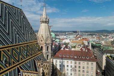View from St. Stephen's Cathedral tower over Vienna, capital of Austria, on a sunny summer da clipart