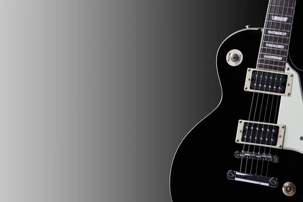 Sezione di un vecchio corpo di chitarra elettrica nera con spazio copia — Foto Stock