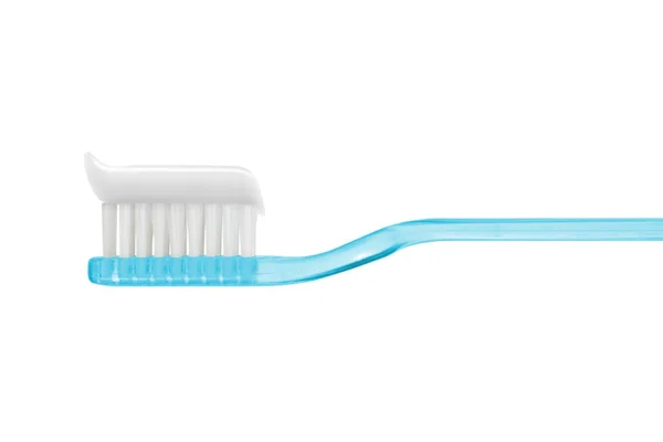 Toothpaste on blue toothbrush isolated isolated on white with cl — Stock Photo, Image