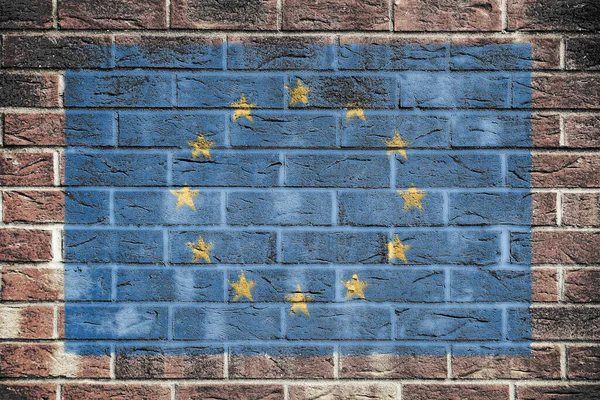 Europese Unie vlag op bakstenen muurachtergrond — Stockfoto