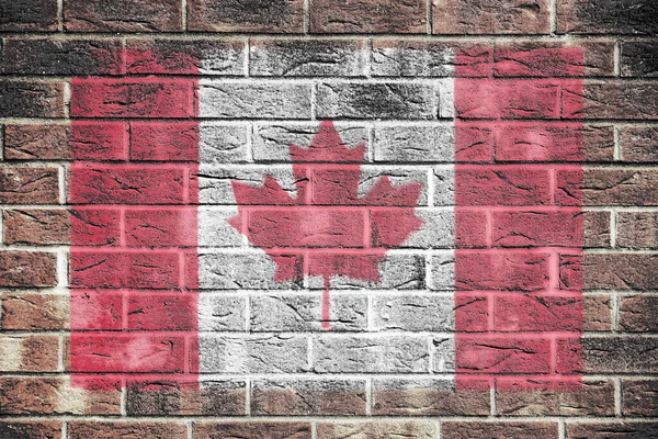 Bandera de Canadá sobre un fondo de pared de ladrillo — Foto de Stock