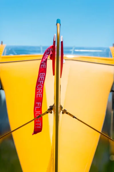 Rear view, tail rudder and red gust lock of small prop airplane. — Stock Photo, Image