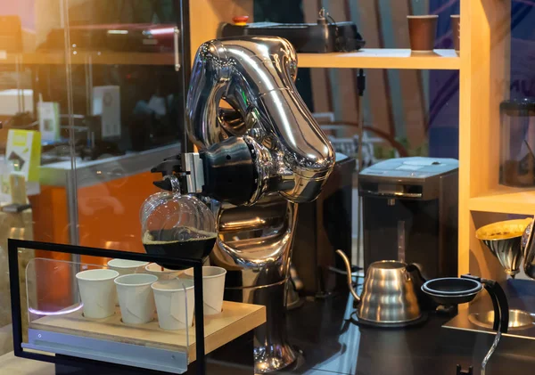 robot mechanical arm make a cup of coffee automatic