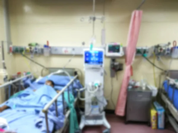 Icu 室患者危機区病院で救急患者をベッドに横になっているぼかし — ストック写真