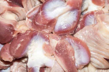 Çiğ tavuk mideleri. Tavuk mideleri arka plan.