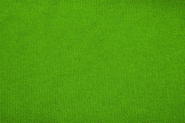 Yeşil yün arka plan örgülü. Yeşil kumaş doku örgülü.