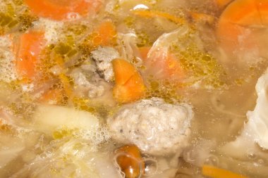 Ekşi çorbası köfte ile. Lahana çorbası köfte ile.