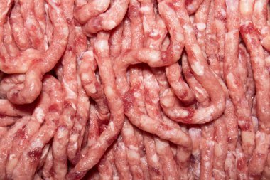Arka plan çiğ kıyılmış et. Kıyılmış et dokusu.