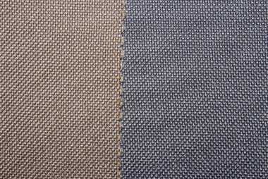 Kumaşlar çok renkli doku örneği. Farklı renkli kumaşların arka plan.