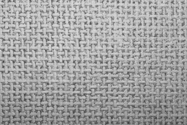 Bej doku bükülmüş kafes içinde. Arka plan t şeklinde semboller.