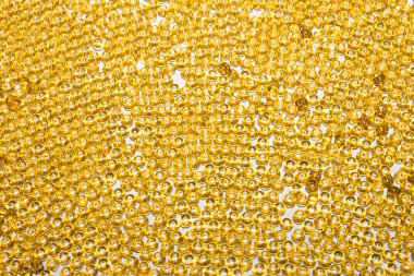 Arka plan sarı sarı boncuk. Doku sarı boncuk.
