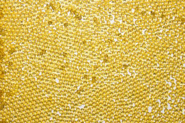 Arka plan sarı sarı boncuk. Doku sarı boncuk.
