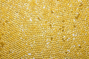 Arka plan sarı sarı boncuk. Doku sarı boncuk.