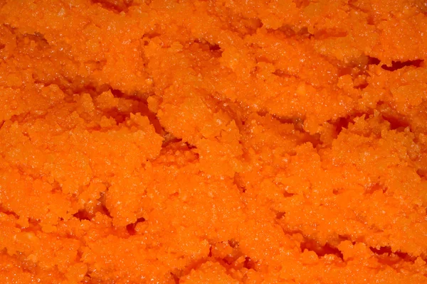 Rendelenmiş havuç. Ezilmiş havuç arka plan.