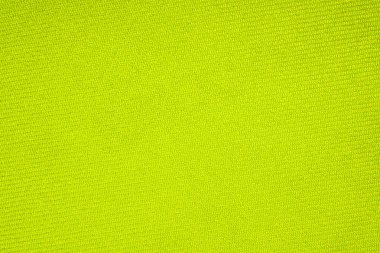 Yoğun açık yeşil kumaş dokusu. Parlak yeşil kumaş Arka Plan.