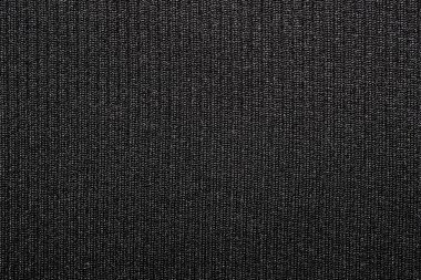 Siyah naylon kumaş. Halının karanlık arka planı. Siyah naylon kumaş.