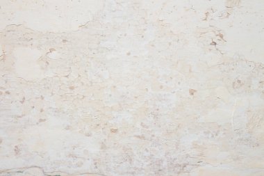 Eski beyaz soyulmuş duvarın dokusu. Eski beyaz boyanın arka planı.