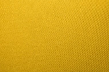 Sarı örme arka plan. Sarı yoğun örgülü doku.