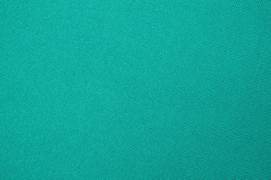 Yoğun açık yeşil kumaş dokusu. Parlak yeşil kumaş Arka Plan.