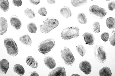 Parmak izleri.Parmak izi ile arka plan. Beyaz arka planda siyah parmak izi.