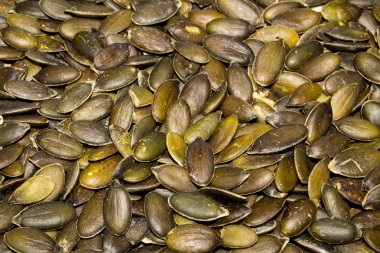 Soyulmuş kabak çekirdeği. Kabak çekirdeği arka planı.