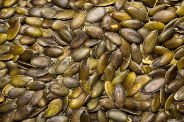 Soyulmuş kabak çekirdeği. Kabak çekirdeği arka planı.