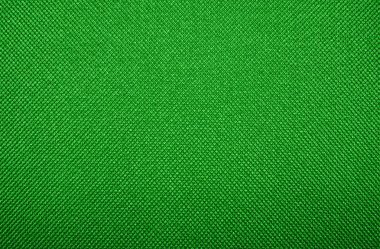 Yoğun açık yeşil kumaş dokusu. Parlak yeşil kumaş Arka Plan.