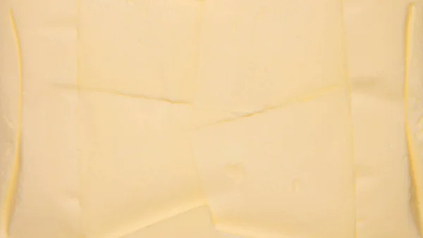 バターオイルの背景バターの素朴な食感 — ストック写真
