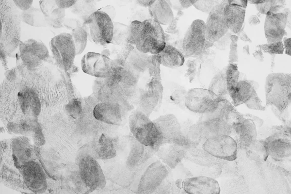 指紋を持つ背景 白い背景に黒い指紋 — ストック写真