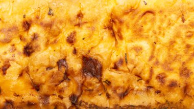 Peynirli pita ekmeği. Çukurun dokusu. Kızarmış peynirli pide ekmeğinin arka planı..