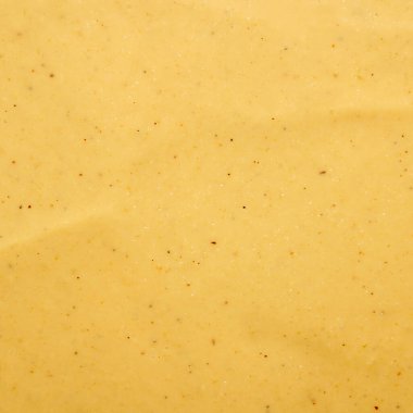 Rus hardalı. Hardalın dokusu. Arka planda sarı hardal..