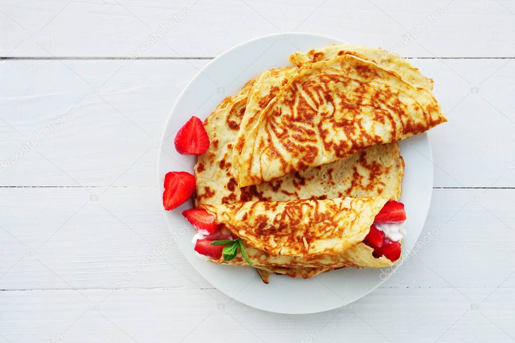 Coconut flour keto wraps with cottage cheese and strawberries