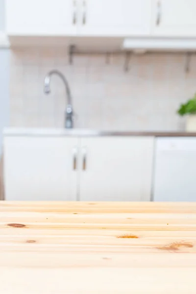 Kitchen Wooden Table Foreground Blurred Counter Top Sink — Stock Photo, Image