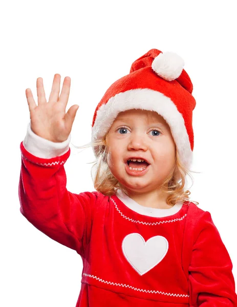 穿着圣诞老人衣服的可爱的高加索女孩挥手看着被白色背景隔离的摄像机 — 图库照片