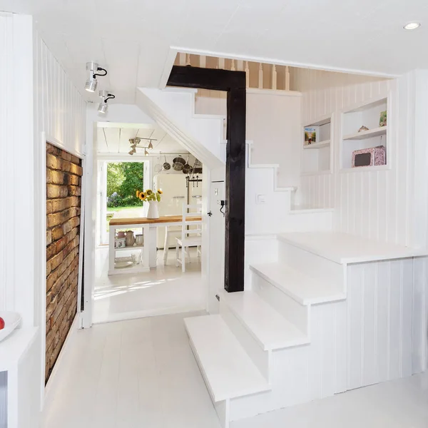 interior of fancy apartment stairs and a wall of hood
