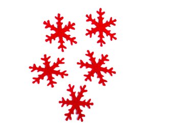 beyaz zemin üzerine kırmızı kar taneleri