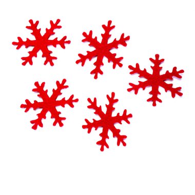 beyaz zemin üzerine kırmızı kar taneleri