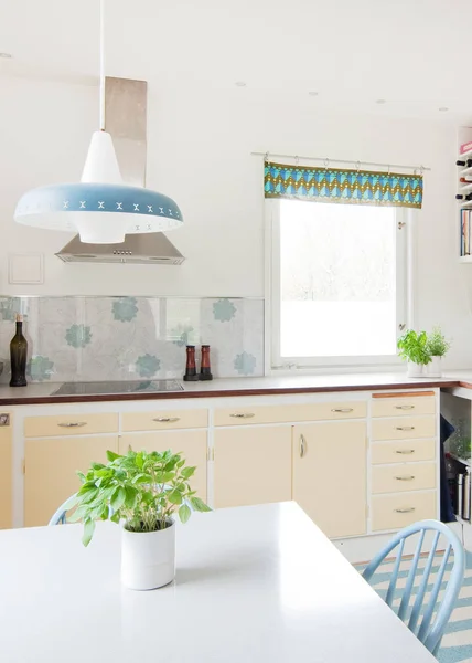 teapot at the kitchen counter on background