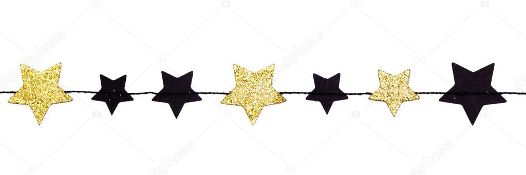 Festive garland pennant with Golden black stars in a row isolated on white