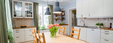 kitchen with flowers and chairs on background