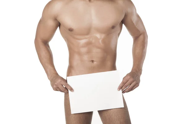 白い背景に分離された白い空の広告バナーを保持しているスポーティな筋肉裸の男クローズ アップ — ストック写真