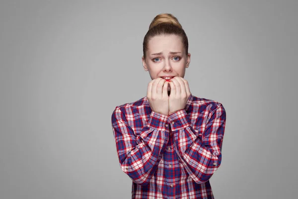 Nervous Blonde Woman Pink Checkered Shirt Collected Bun Hairstyle Looking — Stock Photo, Image