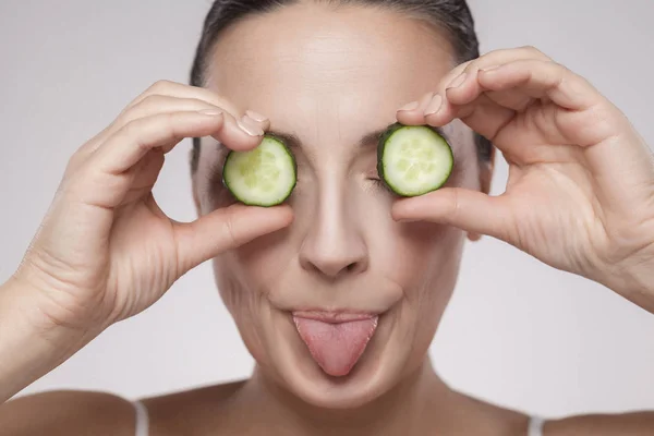 Healthy Middle Aged Holding Slices Cucumber Grey Background — Stock Photo, Image